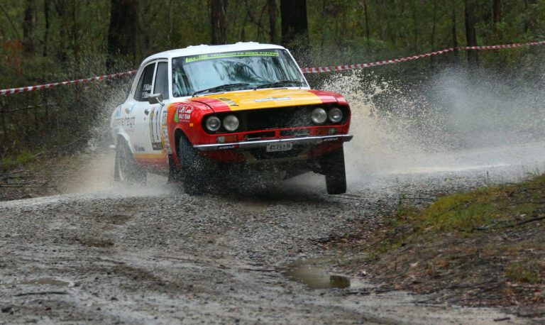 Nathan Quinn and Ray Winwood Smith in their Mazda RX2.