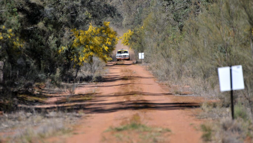 Rally Car approaching a hazard